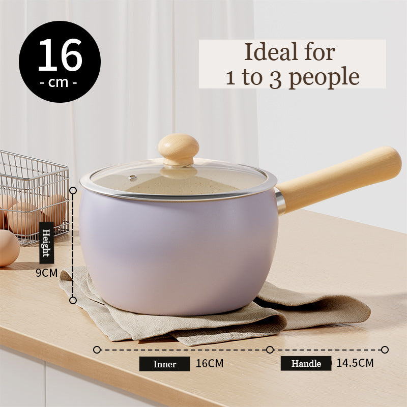 Cute and pretty purple pot with wooden handle and lid on a light surface, solo cooking, Mini pot with Ceremic coating, non-stick.