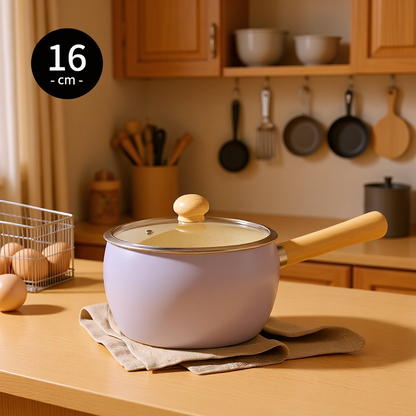 Cute and pretty purple pot with wooden handle and lid on a light surface, solo cooking, Mini pot with Ceremic coating, non-stick.